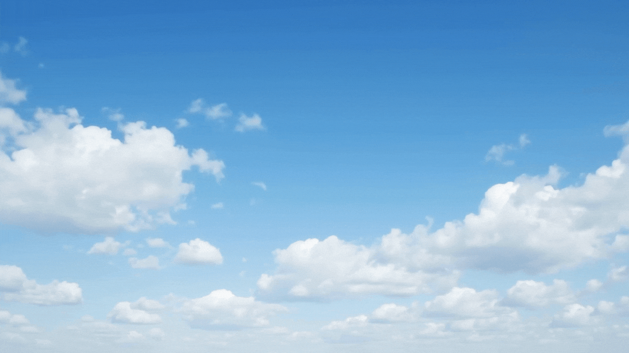 Nine IT em céu azul com nuvens
